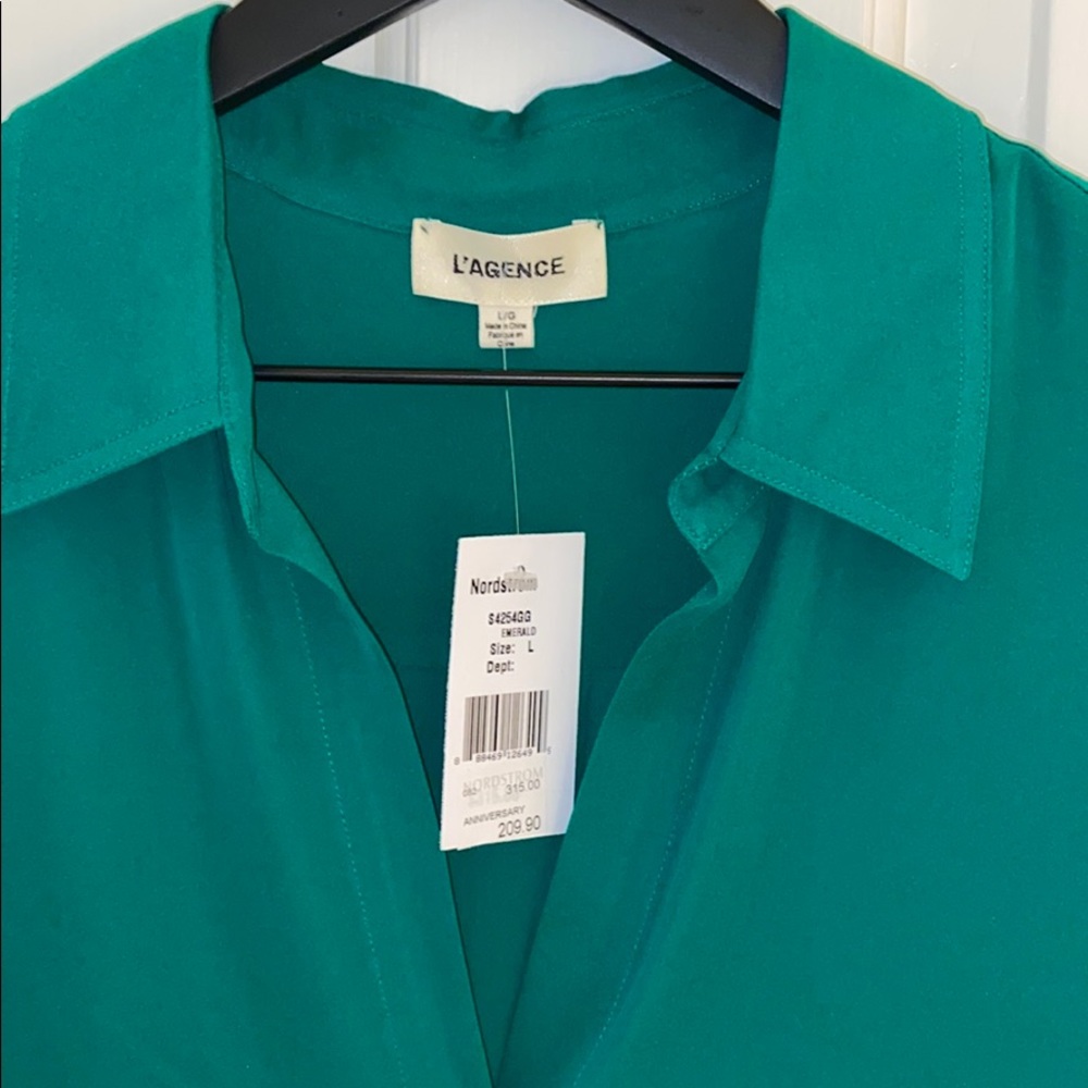 Long sleeve emerald green blouse.